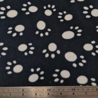Fleece And Fur Patterned Fleece Paw Prints White on Black