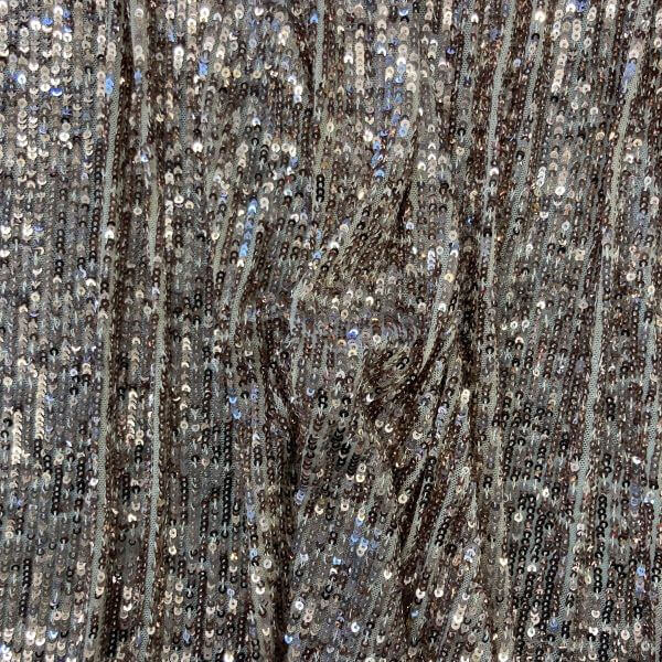 Occasion Fabrics Sequinned Stretch mesh with silver sequins